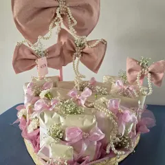 The full view of my "Bows & Pearls" trousseau design. Multiple gifts are individually wrapped and adorned with satin ribbons and pearls, while large, structured bows add a touch of drama and elegance.