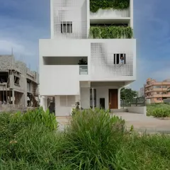 The LUCID House showcases our approach to urban residential architecture on a compact site. A dynamic, perforated metal screen on the facade provides privacy while allowing filtered light to create shifting patterns within the home throughout the day.