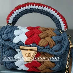 This multi-color crochet puff bag has a patriotic feel with its red, white, and blue tones, mixed with earthy brown and grey.