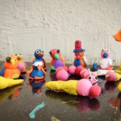 I am so proud of how beautifully these small kids sculpted these clay figures. Look at the little hats and umbrellas.