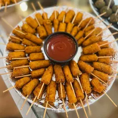 Crispy Babycorn Sticks served with a tangy dip. These are one of my most loved serve-around starters, perfect for guests to enjoy while mingling during a sangeet or reception.
