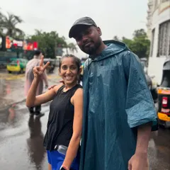 Rain or shine, the run must go on. A couple of our members posing for a quick picture during a rainy Sunday run.