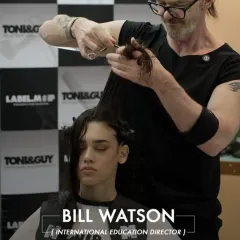A close-up of mastery. Bill Watson, our International Education Director, executes a precision cut during a live demonstration, showcasing the focus and technical skill that defines the Toni&Guy educational method.
