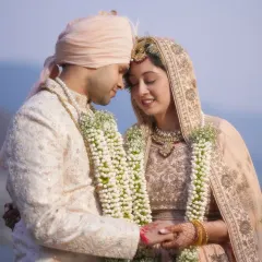 An intimate moment between the bride and groom, framed by the serene nature of Taj Corbett. I focus on creating spaces where couples can connect and feel the magic of their special day.