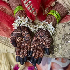 Alhamdulillah, the final stain is what it's all about. This is the deep, maroon-brown color you can expect from my all-natural, chemical-free henna paste, beautifully complementing the bride's attire.