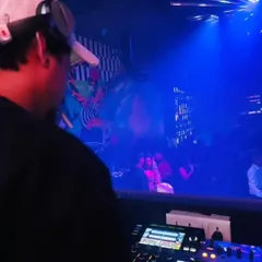 Here you can see my Pioneer DJ setup in action during a busy club night. I use top-tier equipment to ensure every mix is clean and powerful.