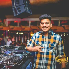 All smiles during my set at Opa Bar & Cafe. A happy DJ means a happy dancefloor, and I always bring positive energy to my performances.