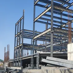 The bare steel frame of the Karkinos Manipur Cancer Care Institute showcases the material's ability to create large-span, efficient structures. This method is pivotal in shaping resilient, future-ready buildings.
