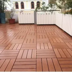 A full terrace floor covered with our interlocking WPC deck tiles. This is a fast and effective way to upgrade a bare balcony or rooftop, creating a clean, usable surface that is both stylish and weather-resistant.