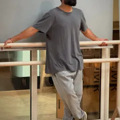 Leaning against the ballet barre in the studio. This space is my sanctuary, where I can think, create, and recharge.
