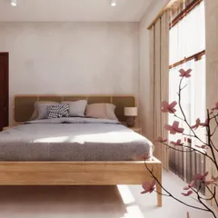 In this Japandi bedroom, I used a light wood bed frame with a rattan headboard and neutral-toned bedding. The focus is on natural textures and sunlight to create a serene and restful sleeping space.