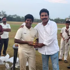 A player receives an award during our domestic tour of Hyderabad, recognizing his excellent performance away from home.