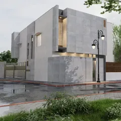 A modern home with a minimalist concrete finish. The design focuses on strong geometric shapes and a clean, uncluttered look that stands out.