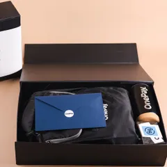 An inside look at the OnePay onboarding box. We carefully arrange each item, including the backpack, tumbler, and welcome envelope, to create a premium unboxing experience.