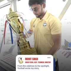 This is our coach and Assistant Technical Director, Mohit Singh, with a championship trophy. Our coaches are winners who lead by example.