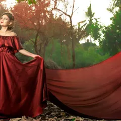 Create a cinematic moment for your pre-wedding photoshoot with this breathtaking maroon gown. The extra long, detachable trail flows beautifully, making every picture look like it's straight out of a movie.