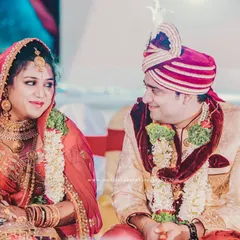 A sweet, knowing glance between the bride and groom during their wedding ceremony. These are the quiet moments that speak volumes.