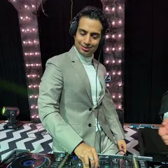 Happy vibes behind the decks. A simple smile captures the joy I feel when the music and the crowd are perfectly in sync.