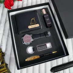 A classic and sophisticated gift set for any man. This hamper includes a vegan leather wallet with a name and charm, a watch, a personalized pen, a keychain with a message, and a bottle of perfume, all neatly presented in a gift box.