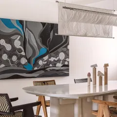 The finished canvas installed in the 'Kanso House,' where it serves as the main artwork in a minimalist dining area.