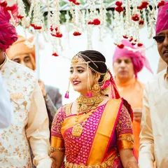 The grand bridal entry, a moment filled with anticipation and beauty, as the bride is escorted to the mandap.