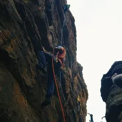 A climber ascends a steep, challenging route during our advanced course. The dramatic overhangs of Badami provide the perfect training ground for pushing your grade.