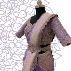 A side view of the lavender saree set, highlighting the embroidered belt and scalloped edges.