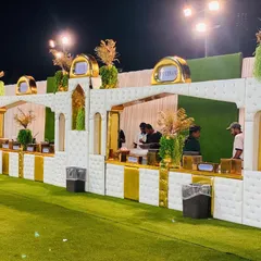My new 2024 counter design, featuring a white padded facade with elegant gold arches and trim.