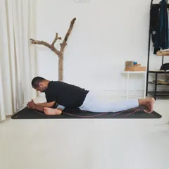Stage 1 of Eka Pada Raja Kapotasana: Firming the base. Before attempting the full pose, we must establish a solid, grounded foundation.