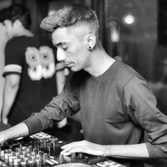 Deep in concentration at the DJ console. I use professional Pioneer DJ equipment to deliver a high-quality, seamless music experience.