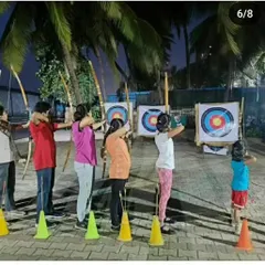 Another view of our students at the shooting line. We ensure each archer has the space and guidance to practice their technique safely.