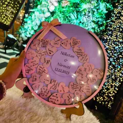 This engagement wish board is filled with love. The pink and lavender theme perfectly matched the event's decor, creating a beautiful and interactive centerpiece.