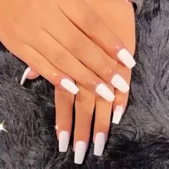 A full set of crisp, opaque white nails in a modern square shape. This look is clean, bold, and versatile.