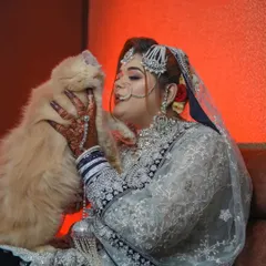 Another angle of the bride and her beloved pet. These are the unique, heartwarming moments that I love to capture to make your wedding album truly yours.