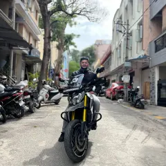 A member sitting on his heavily modified Dominar 400 Supermoto. This bike is a great example of how our members personalize their rides.