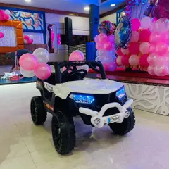 A fun prop for a first birthday party. This mini ride-on toy car can be a great addition for photos and for the birthday boy or girl to enjoy.