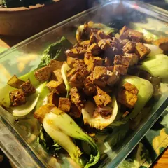 A healthy and flavourful dish of Bok Choy stir-fried with tofu in a savoury black bean sauce, perfect as a main or side dish.