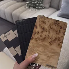 The design process always starts with materials. These samples of burled wood and textured veneers set the tone for a project before the walls even go up, establishing a foundation of quality and tactile richness.