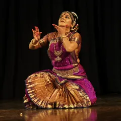 Here, I am looking towards the divine, a common theme in Bharatanatyam where the dancer communicates with the gods. This pose, part of a narrative piece, shows a moment of prayer and surrender.