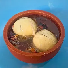 Our Rasgulla candle is one of my most hatke creations. Two juicy-looking rasgullas float in a scented gel wax inside a traditional earthen pot, complete with rose petals. It’s a fun, desi twist that brings a smile and a beautiful glow.