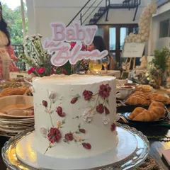 Sweetness is in full bloom. Our layered "Baby in Bloom" acrylic topper in soft pink and white is a delicate and beautiful choice for a baby shower cake.