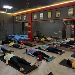 The final and most important pose: Savasana (Corpse Pose). This is where the body and mind integrate the benefits of the practice, leading to deep relaxation.