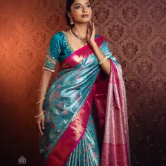 For this traditional wear shoot, my focus was on the rich texture and color of the silk saree. The studio lighting is carefully set to make the fabric's sheen and intricate details pop, creating an image of timeless South Indian elegance.