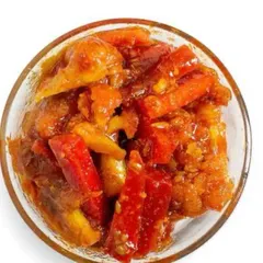 A close-up look at the vibrant colours and textures of my Gobi Gajar Shalgam achar. You can see the chunks of fresh cauliflower, carrot, and turnip in every bite.