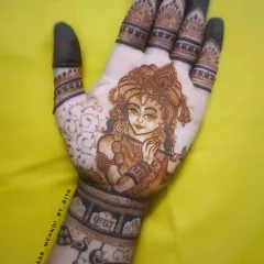 A finished Krishna portrait, complete with his flute and peacock feather. I'll show you how to use negative space and shading to make the figure stand out.