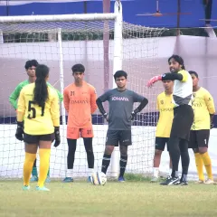 An AIFF instructor demonstrates proper technique to our men's and women's goalkeepers during a specialized clinic.