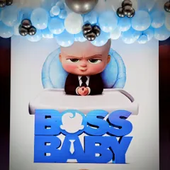 A close-up of the Boss Baby backdrop, featuring the main character and a 3D logo.