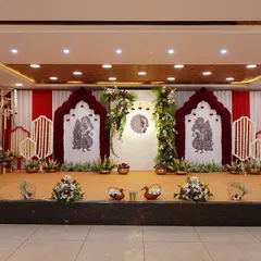 This traditional naming ceremony was designed around the baby's name, Mitakshi, which is another name for Maa Durga. I created a serene and sacred atmosphere using rich red fabrics, intricate peacock illustrations, and beautiful floral arrangements to honor the family's story.