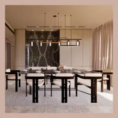 This contemporary dining room is all about sophisticated drama. We used a striking book-matched marble panel as a backdrop, paired with a concealed crockery unit and sleek furniture to create a space perfect for formal entertaining.