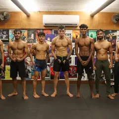 A lineup of fighters, each one a testament to the process. The journey is hard, but the results are undeniable. This is what our strength and conditioning program produces: athletes ready for anything.